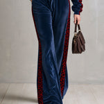 Casual dark blue faux-fur hooded velvet jumpsuit with leopard-print details