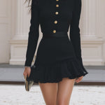 Elegant Black Ribbed Knitted Mini Skirt With Gold Buckle Ruffle Hem