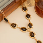 Gold Tone Tiger Eye Y Drop Textured Frame Alloy Necklace