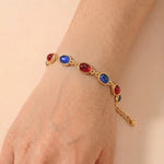 Gold Tone Alternating Red Blue Cabochon Alloy Bracelet
