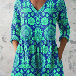 Romy | Loose-fitting blouse with eye-catching design