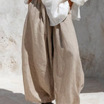 Casual white long-sleeve shirt and khaki trousers set