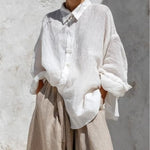 Casual white long-sleeve shirt and khaki trousers set