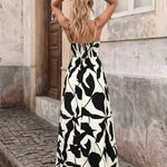 Black Leaf Print Spaghetti Strap Tiered Flowy Maxi Dress