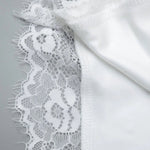 White Off-Shoulder Lace Trimmed Asymmetric Hem Top