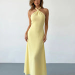 Buttery Yellow Halter Twist Neck Textured Maxi Dress