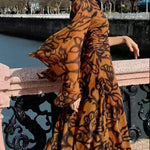 Brown long printed dress with wide sleeves