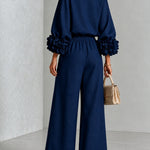 Navy Top Featuring Striking Floral Cuffs Paired With Wide-leg Pants Suit